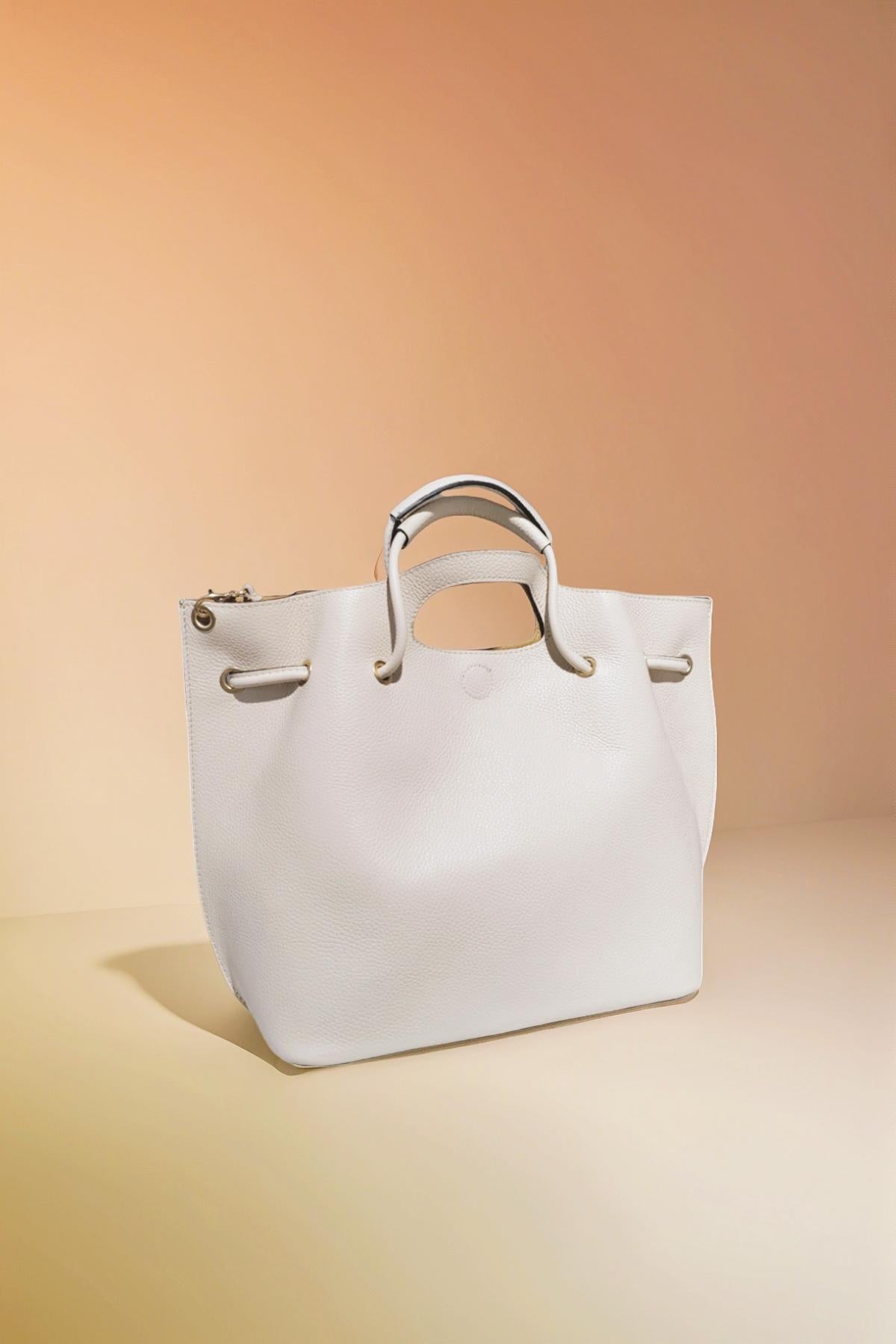 Chic White Leather Bag with Adjustable Strap
